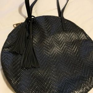 Brand New but no tag.  Big shoulder tote plenty of room three inside pockets.